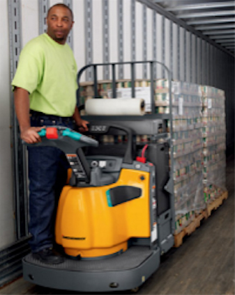 A man standing on an electric cart